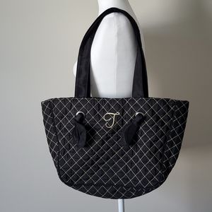 Quited shoulder bag with "T" initial